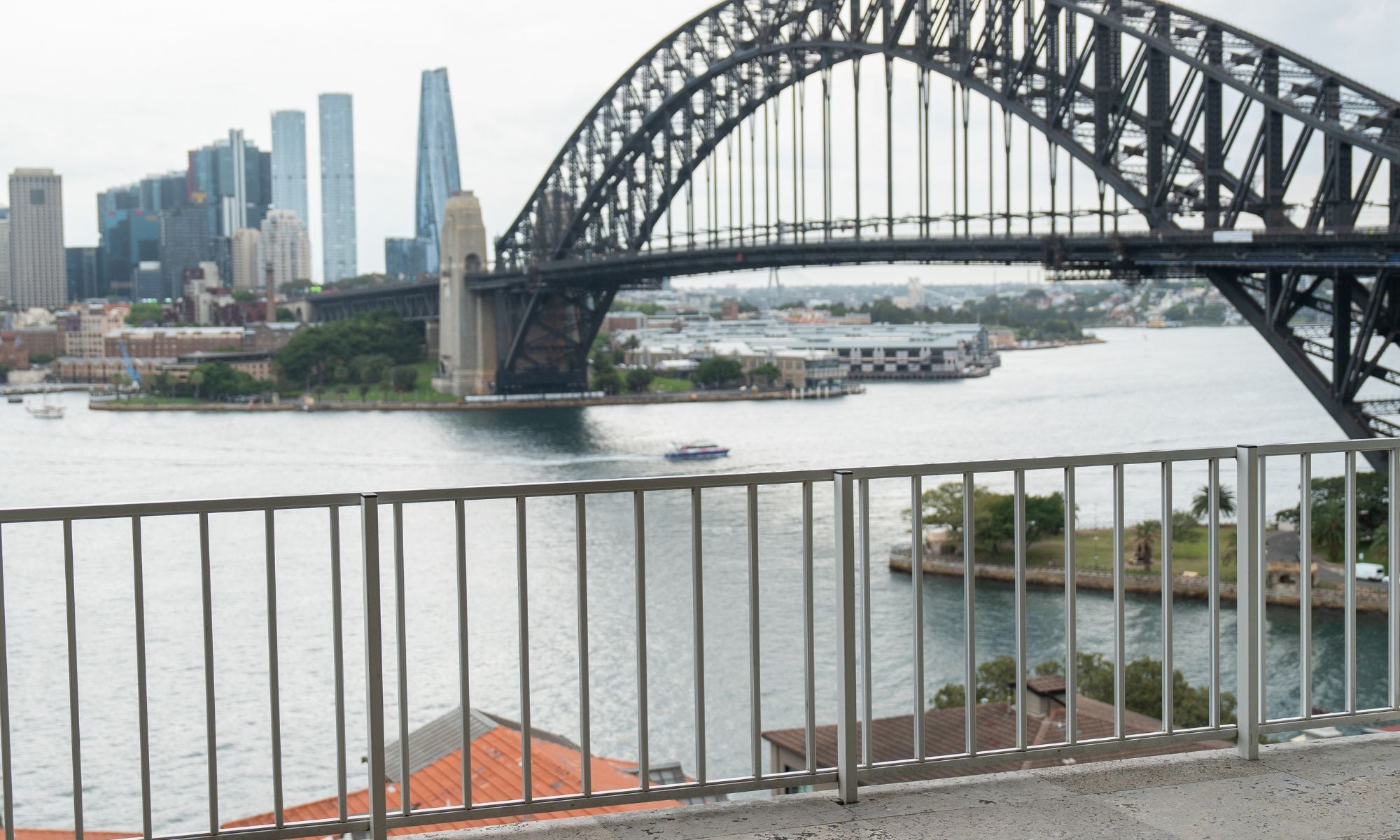 Balcony with Bridge and city skyline in the background