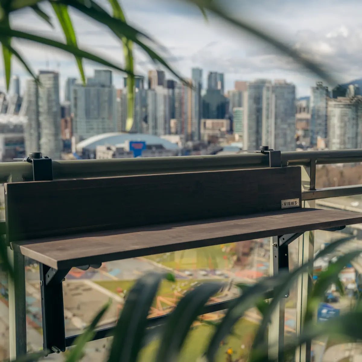 Views Balcony Bar (3Ft) charcoal grey connected to railing with a city view