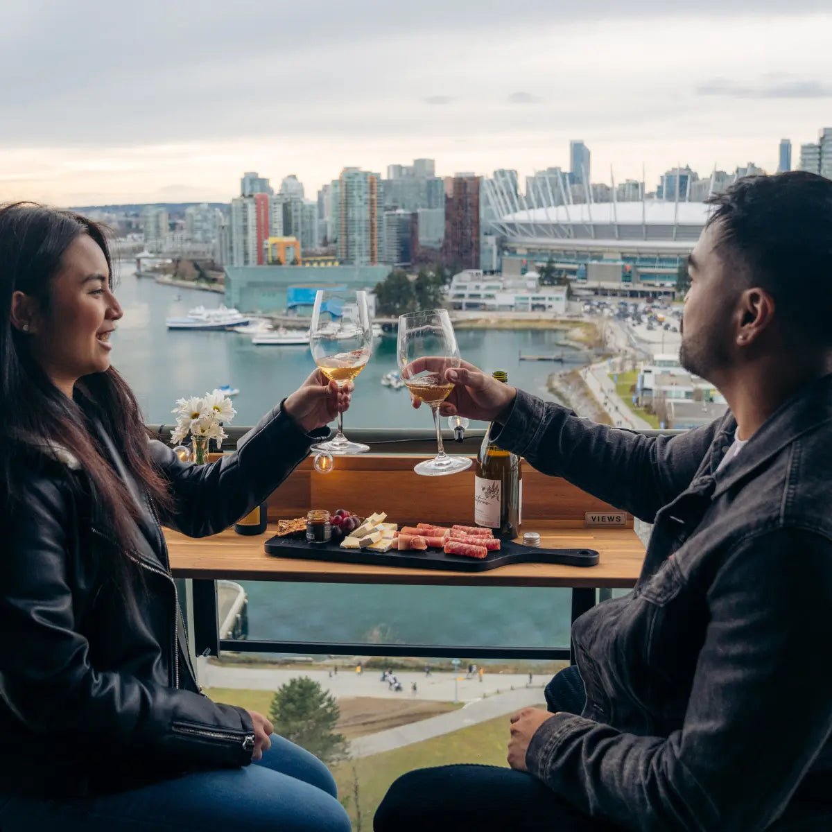 Views Balcony Bar (3Ft) couple on a date enjoying a glass of wine and charcuterie on their balcony bar table in Canada